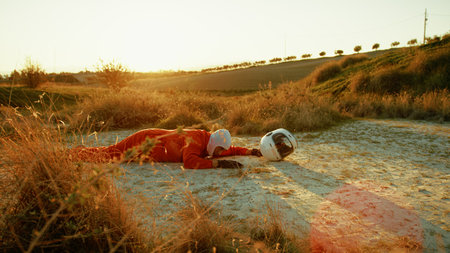 Astronaut in a helmet on a hostile planet with a toxic atmosphere.の写真素材