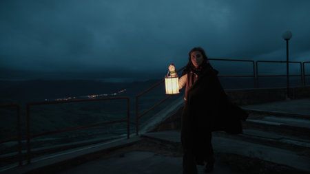 Mysterious Woman Searches for Her Missing Friend at Night in the Squareの写真素材