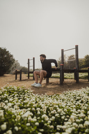 Boy Trains With Commitment At The Park Under The Sun