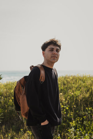 Man Waiting For Somone To Come Near The Sea And Pick Him Up