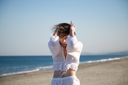 Calabria Dancer Girl On The Beach Near The Seaの写真素材