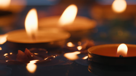 Candles floating in river water for Diwali festival