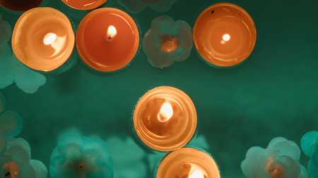Floating candles in water for the Indian festival of Diwaliの写真素材