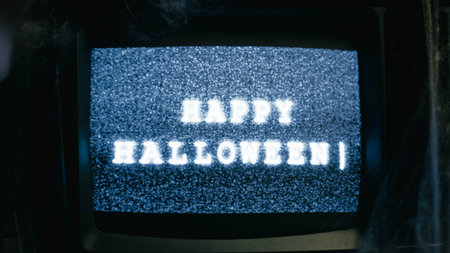 Vintage TV with Noise signal and Happy Halloween Text type