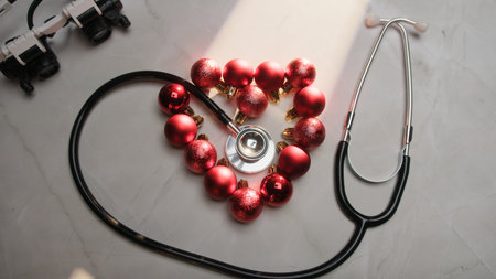 Cardiologist Doctor Wishes Merry Christmas With A Heart Stethoscope Backgroundの写真素材