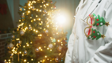 Ophthalmologist Doctor With White Coat wishes you a Merry Christmas Against Treeの写真素材