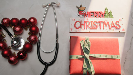 Cardiologist Doctor Wishes a Merry Christmas with a Small Giftの写真素材