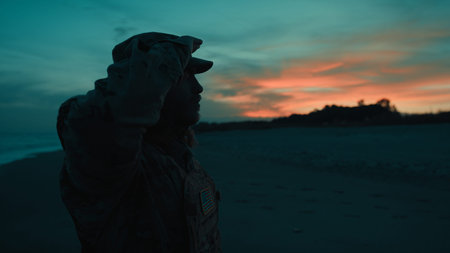 Silhouette of an American soldier salutes the victims during Memorial Day