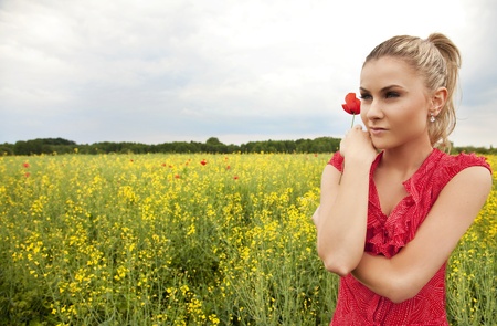 Young woman relaxing on green meadow の写真素材