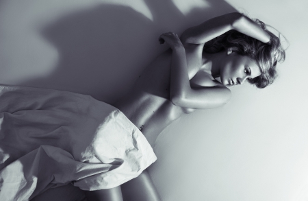 black and white photo of delicate woman in lingerie の写真素材