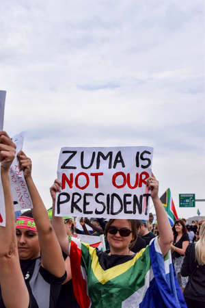 JOHANNESBURG, SOUTH AFRICA - APRIL 7, 2017: South African citizens protesting the presidency of South African President Jacob Zumaのeditorial素材