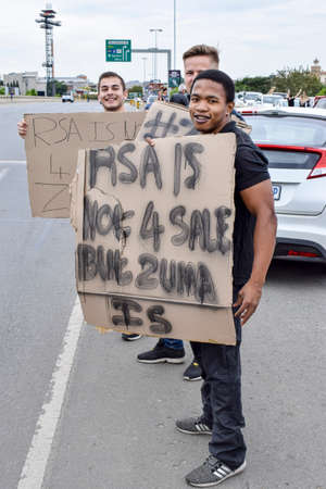 JOHANNESBURG, SOUTH AFRICA - APRIL 7, 2017: South African citizens protesting the presidency of South African President Jacob Zumaのeditorial素材
