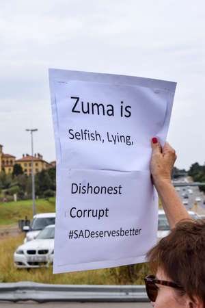 JOHANNESBURG, SOUTH AFRICA - APRIL 7, 2017: South African citizens protesting the presidency of South African President Jacob Zumaのeditorial素材