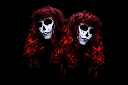 dark twin skullsの写真素材