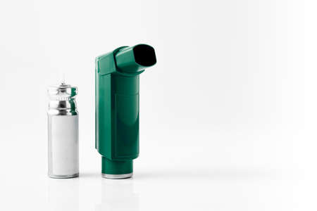 Green MDI Inhaler. Asthma and Allergy aerosol for people with respiratory problems. White neutral...