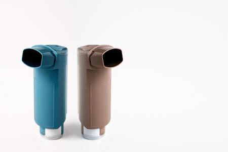MDI Inhaler. Salbutamol and Budesonida. Asthma and Allergy aerosol for people with respiratory problems. White Neutral Background and Copy Spaceの写真素材