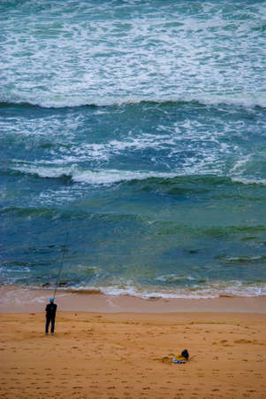 Fisherman on the Beachの写真素材
