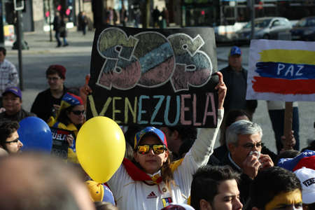 Venezuelans in Portugal Protest Against Venezuelan President Nicols Maduro in Porto, Portugal on 02/22/2014のeditorial素材