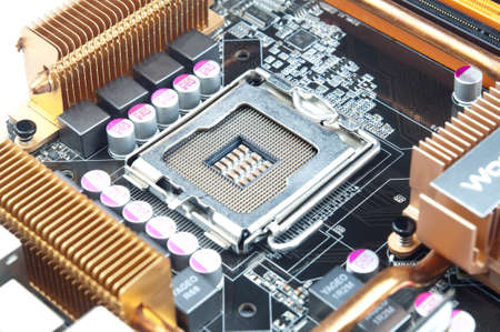 CPU socket on a plate with condensers and coolers 