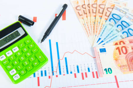 Graphics of forex with calculator, pen and euro billsの写真素材