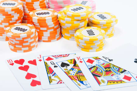 Poker chips piled with a flushの写真素材