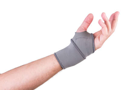 Hand with a wrist strap rehabilitation isolated on white backgroundの写真素材