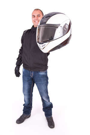 Biker offering his helmet on white backgroundの写真素材