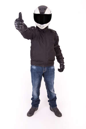 Biker with thumbs up on white backgroundの写真素材