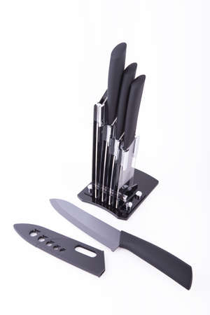 Black and silver knife set on white backgroundの写真素材