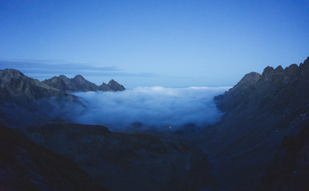 Mountains in the clouds. Hiking through mountains, Vysoke Tatry, Hight Tatras Slovakia