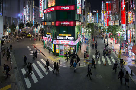 Tokyo, Japan, November 19, 2020: Many people walking through the Shinjuku neighborhood.のeditorial素材