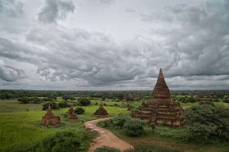 Beautiful sunrise over old pagodas of an ancient city of Bagan, Myanmarの写真素材