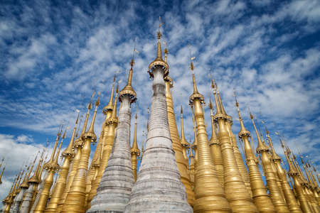 Shwe Indein Pagoda and golden stupas with bells, Inle Lake, Shan State, Myanmar Burma.の写真素材