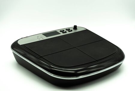 electronic battery of percussion pads isolated with white background, seen from above