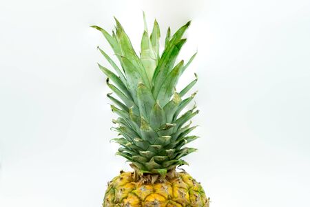 View of Pineapple isolated on white background in the center of the image. Tropical fruit. Healthy food concept.の写真素材