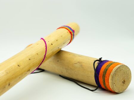 Peruvian rain sticks on a white background. Ambient sound. Concept percussion instruments.の写真素材