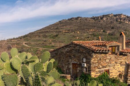 Panoramic view of a stone house in Patones de Arriba on a sunny day Madrid, Spain. Landscape concept.の写真素材