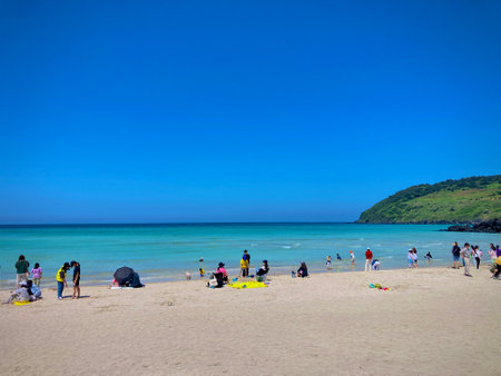 Unidentified people relax on the beach in Phuket, Thailand.の写真素材