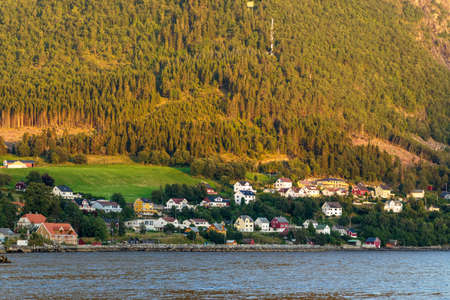Sunset at the city of Volda, Norway, shoot from the water.の写真素材