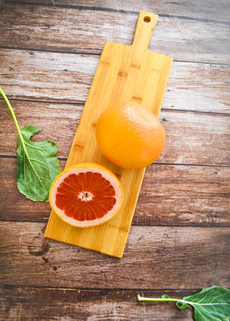 Grapefruits on cutting board. Health lifestyle. Weight lossの写真素材