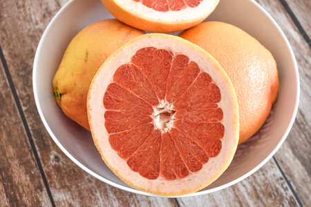 Close up of grapefruits in bowlの写真素材