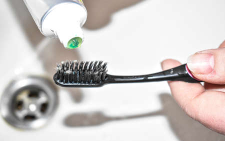 toothpaste on toothbrush