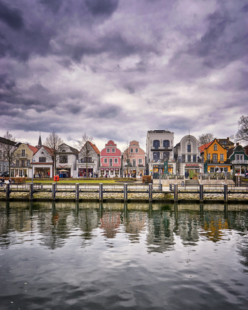 Warnemnde cityscape at the old canal or old stream. The once sleepy fishing village was founded in 1200.のeditorial素材