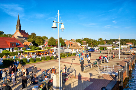 Tourists in the harbor of Schaprode. From here drive the ferryboats to the island Hiddensee. A very popular destination.のeditorial素材