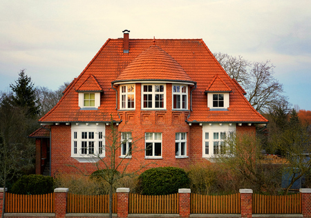 Facade of a german brick house in the evening sun. Mecklenburg-Western Pomerania, Germany.のeditorial素材