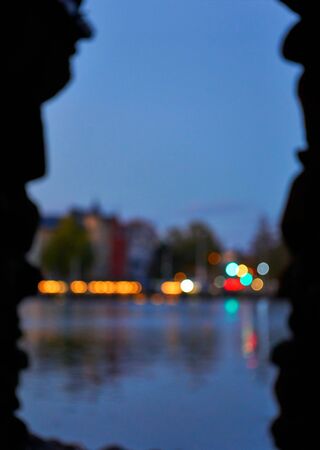 Blurred colorful lights of the night city in the background.の写真素材
