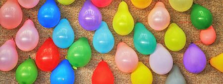 Pannorama of colorful balloons as a background.