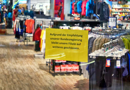 Closed sign in German script. Recommendation of our federal government.のeditorial素材