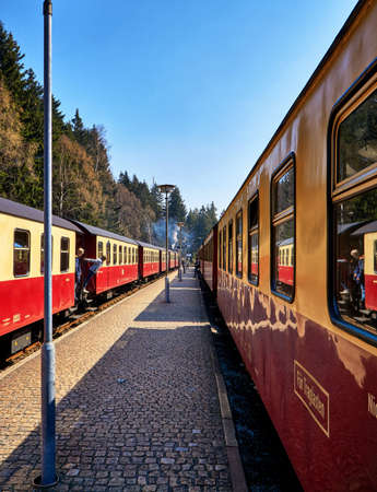 Passenger wagon of an old steam locomotive at a railway station.のeditorial素材