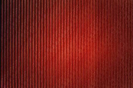Red and dark red background with abstract pattern stripes.の写真素材